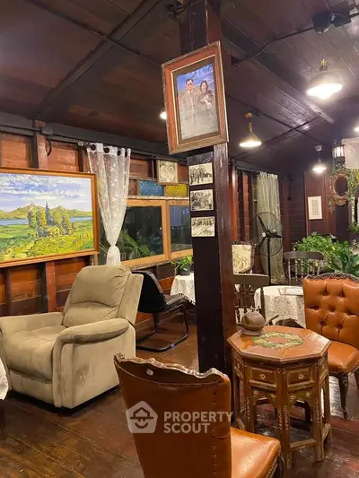 Charming rustic living room with wooden interiors and vintage decor, perfect for cozy gatherings.
