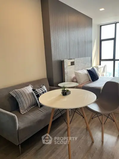 Modern studio apartment with stylish decor and natural light