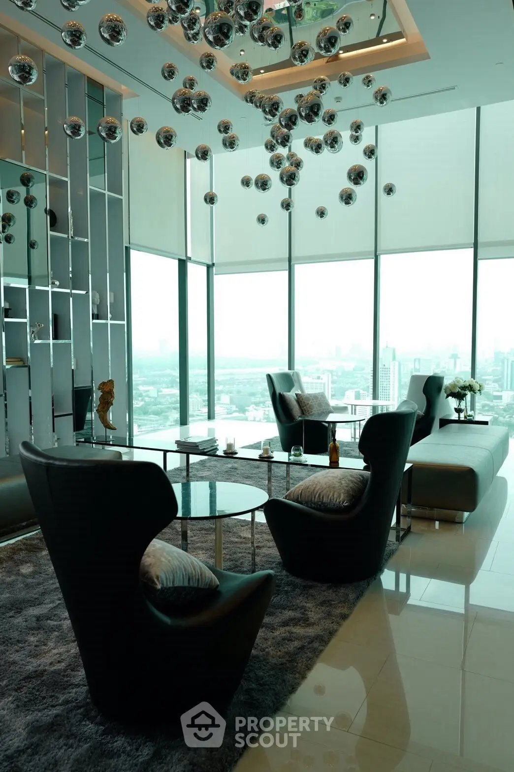 Luxurious modern living room with panoramic city views and stylish decor.