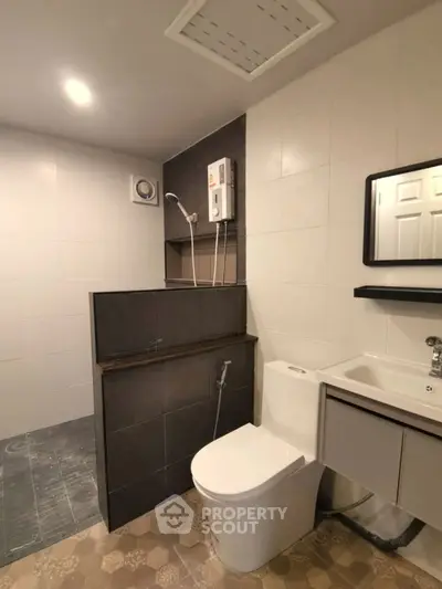 Modern bathroom with sleek fixtures and stylish tile design