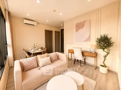 Elegant living room with stylish decor and dining area in modern apartment
