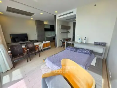 Modern living room with open layout and stylish furniture in a contemporary apartment.
