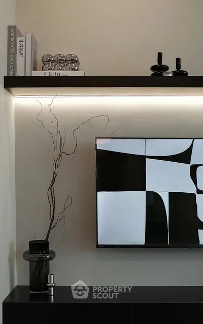 Modern living room with stylish decor and wall-mounted TV