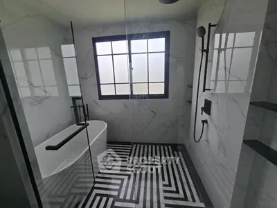 Luxurious bathroom with modern design and elegant marble finishes