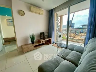 Bright living room with balcony view and modern decor