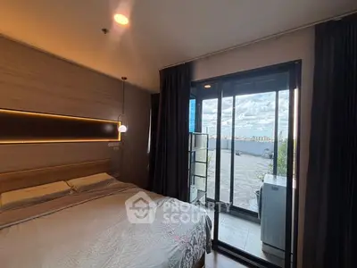 Modern bedroom with balcony offering stunning city view