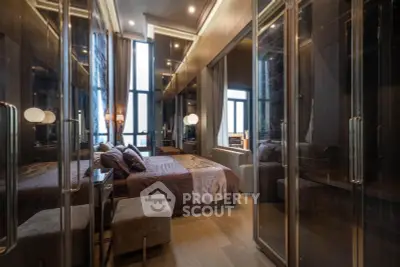 Luxurious bedroom with floor-to-ceiling windows and elegant decor