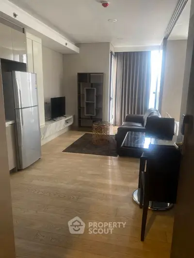 Modern living room with sleek furniture and natural light