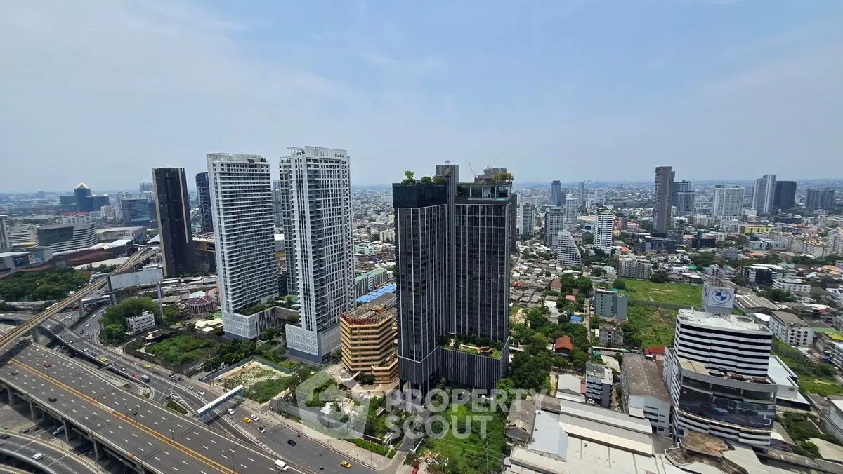 Stunning cityscape view with modern high-rise buildings and bustling urban landscape.