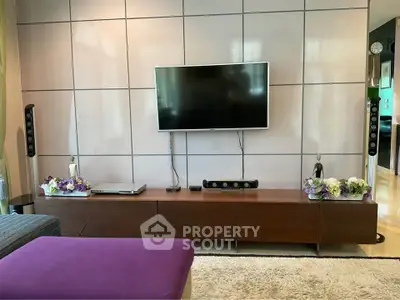 Modern living room with sleek TV setup and stylish decor