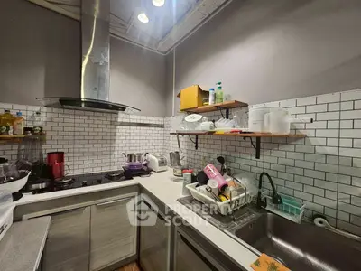 Cozy kitchen with modern appliances and open shelving