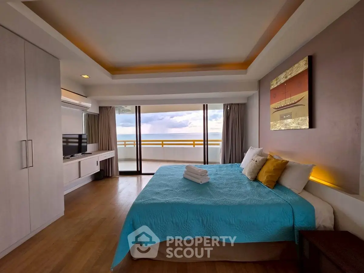 Luxurious bedroom with ocean view and modern decor