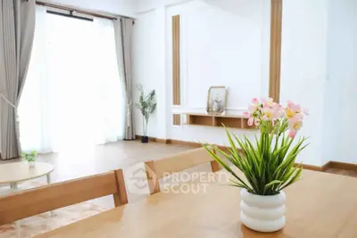 Bright and airy living room with modern decor and large windows