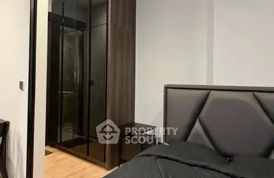 Modern bedroom with sleek design and ensuite bathroom