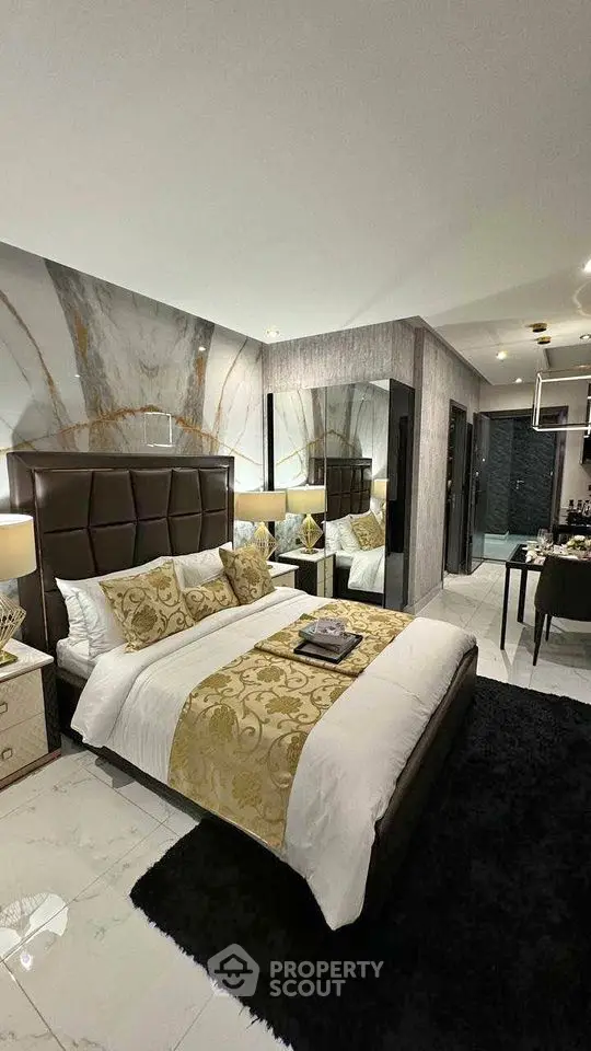Luxurious modern bedroom with elegant decor and plush bedding