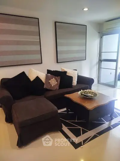 Cozy living room with stylish sofa and modern decor