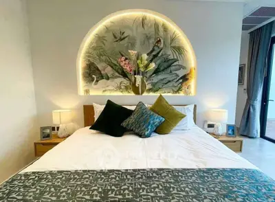 Luxurious bedroom with elegant decor and ambient lighting