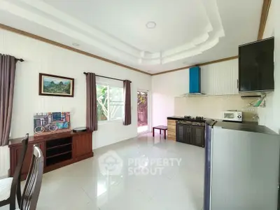 Spacious kitchen with modern appliances and open layout design.