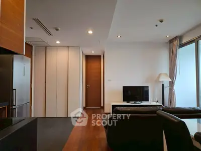 Modern living room with sleek design and balcony access