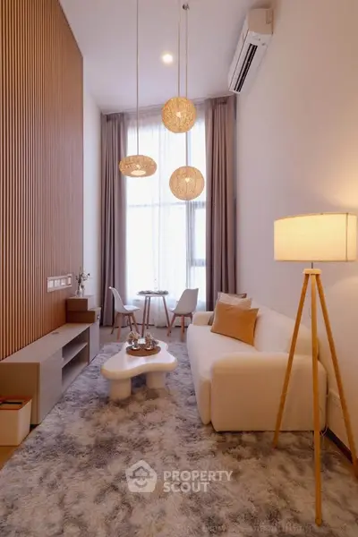 Modern living room with stylish decor and cozy seating area