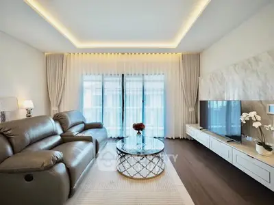 Luxurious modern living room with elegant decor and plush seating