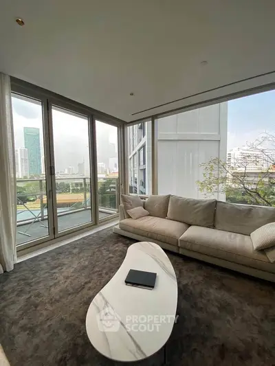 Luxurious living room with panoramic city view and elegant furnishings
