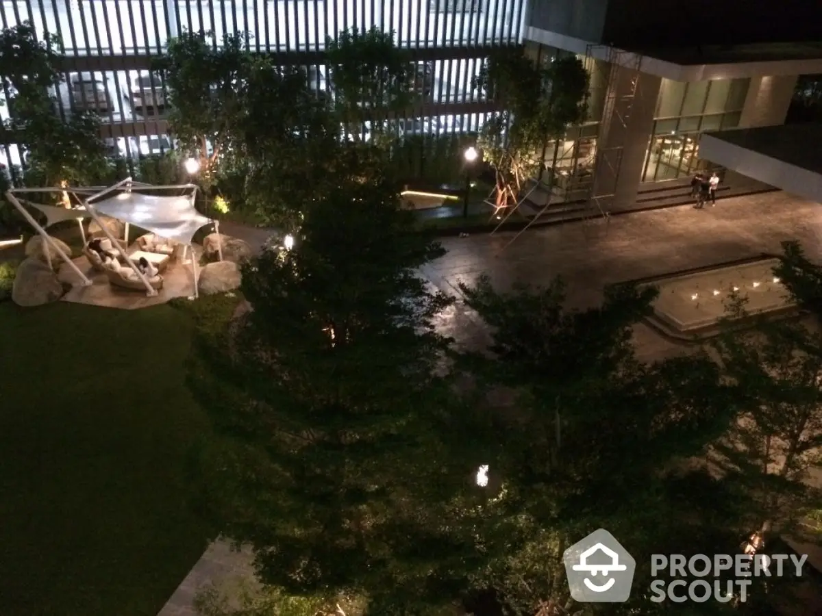 Luxurious garden view with modern architecture and ambient lighting at night