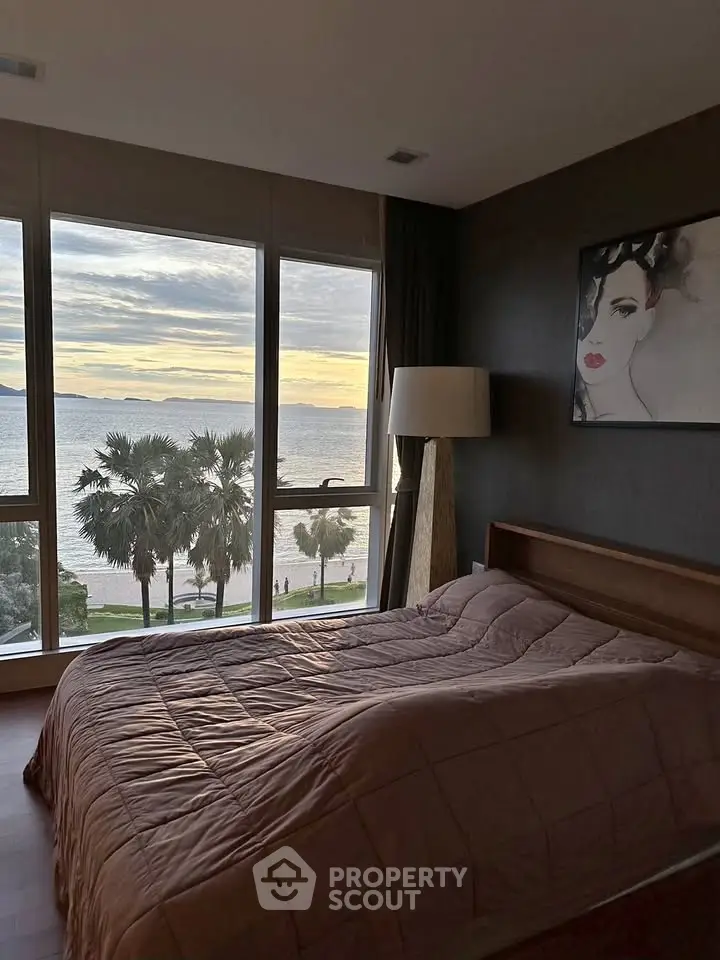 Luxurious bedroom with stunning ocean view and elegant decor