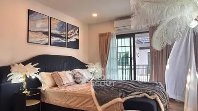 Luxurious bedroom with elegant decor and balcony access