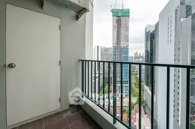 High-rise balcony with stunning cityscape view, perfect for urban living enthusiasts.