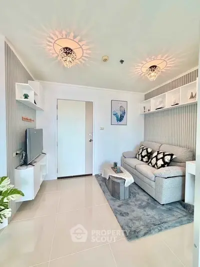 Modern living room with elegant lighting and cozy decor