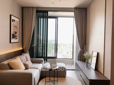 Modern living room with cozy sofa and balcony view in stylish apartment