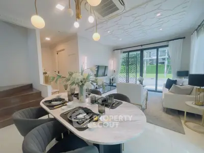 Luxurious modern living room with elegant dining area and stylish decor
