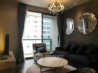 Luxurious living room with elegant decor and large window offering city view
