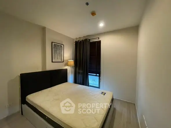 Cozy bedroom with modern decor and natural light