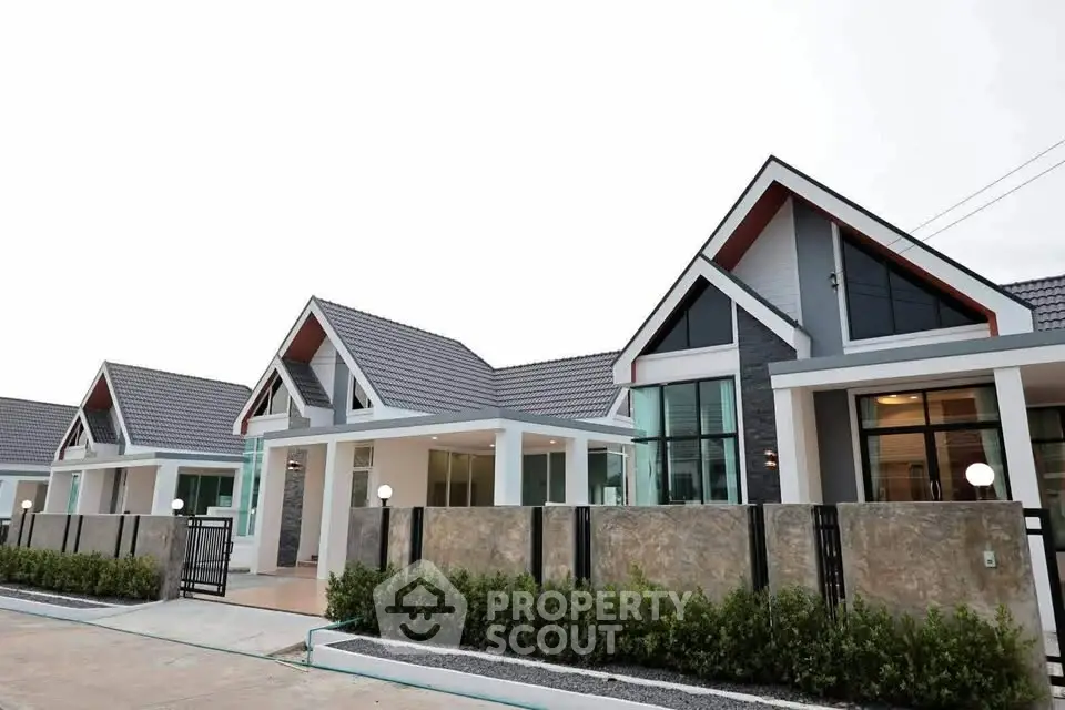 Modern townhouse exterior with sleek design and spacious layout, perfect for family living.
