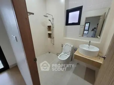 Modern bathroom with sleek fixtures and a minimalist design