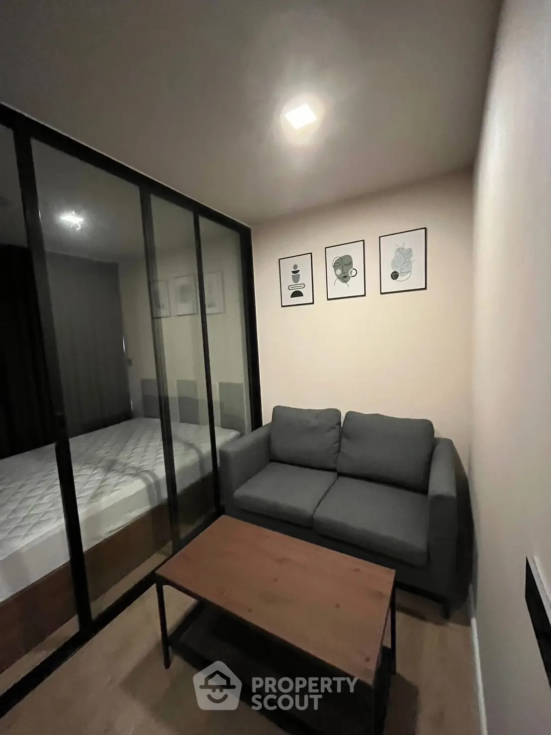 Cozy modern living room with glass partition and stylish decor