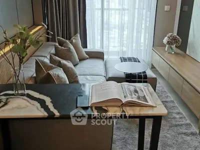 Modern living room with stylish decor and natural light