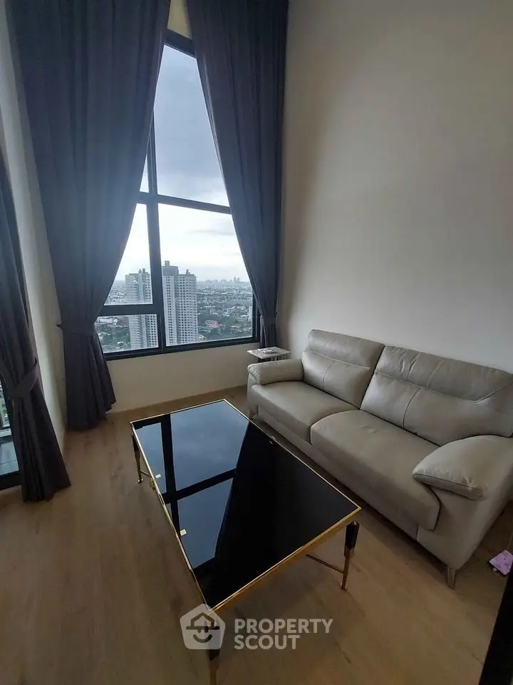 Stylish living room with panoramic city view and elegant furnishings