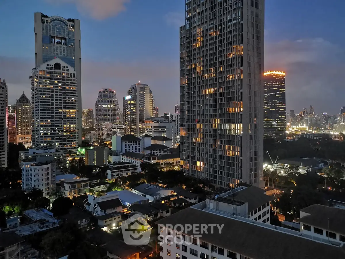 Stunning cityscape view with illuminated skyscrapers at dusk, showcasing urban living at its finest.