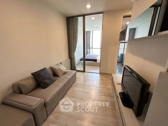 Modern living room with sleek design and cozy ambiance