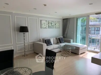 Spacious modern living room with elegant decor and natural light