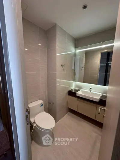 Modern bathroom with sleek fixtures and elegant tile design
