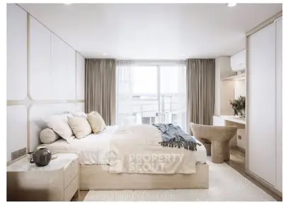 Luxurious modern bedroom with elegant decor and large window view