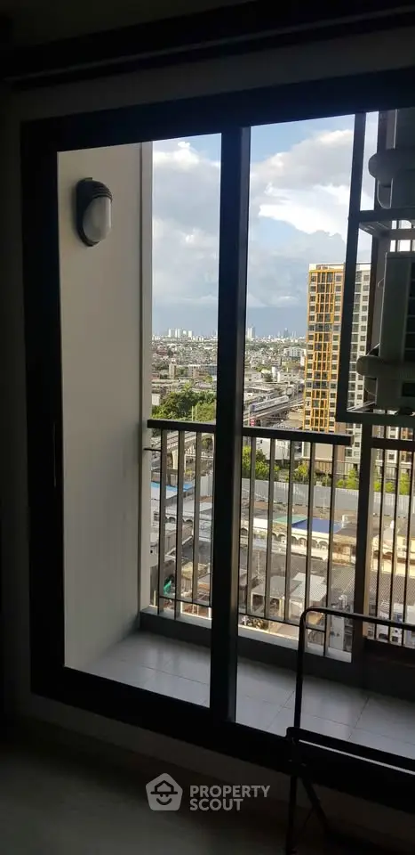 Modern apartment balcony with city view, perfect for urban living enthusiasts.