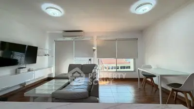 Modern living room with sleek furniture and natural light