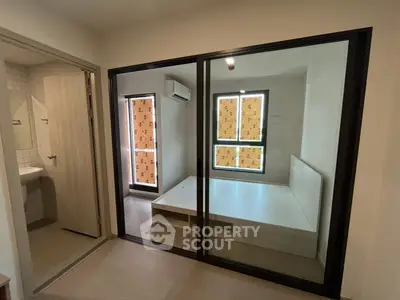 Modern apartment interior with glass partition and minimalist design