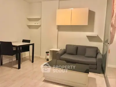 Cozy living room with modern furniture and dining area