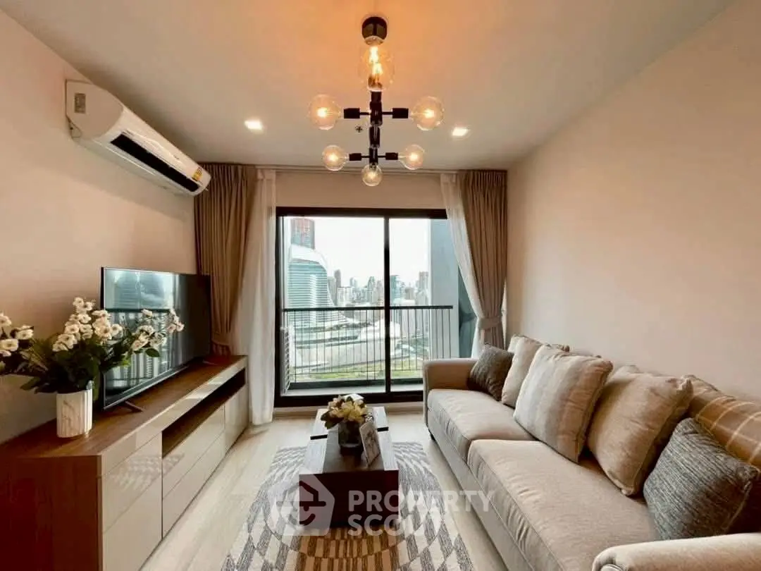 Modern living room with city view, stylish decor, and large windows in a high-rise apartment.